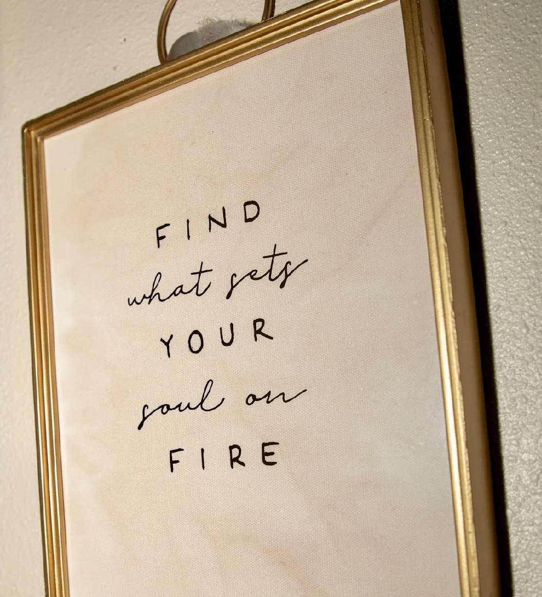 Framed print reading "Find what sets your soul on fire" in Alicia Wright's Mesa, Arizona therapy office